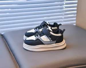 Detail of children's sneaker featuring diamond quilting and secure velcro strap