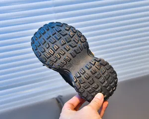 Detailed view of durable non-slip rubber sole for children's sneakers in size 26