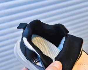 Macro view of mesh lining and light blue breathable insole in children's sneakers