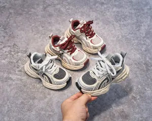 Detail of children's breathable mesh sneakers with chunky anti-slip cushioned soles