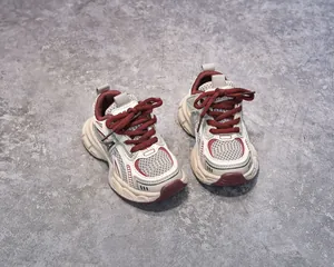 Top view of kids chunky sneakers featuring beige synthetic leather and grey mesh fabric