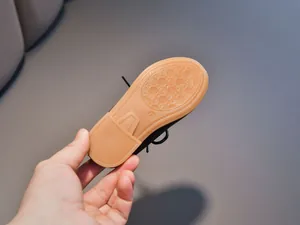 Close-up of durable khaki rubber sole with non-slip texture for children's shoes