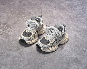 Detail of children sneakers showing breathable mesh fabric and durable non-slip thick sole