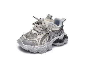 Detailed side view of girls breathable mesh chunky sneakers with wave-patterned soles