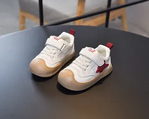 Close-up of toddler sneakers with non-slip rubber toe cap and Velcro straps