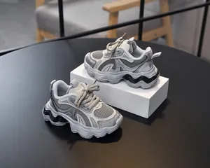 Close-up of girls' chunky sneakers with breathable mesh fabric and thick anti-slip sole