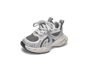 Detail of breathable mesh and PU leather splicing on kids chunky fashion sneakers