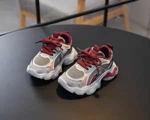 Detail of burgundy and grey mesh girls' chunky sneakers with soft breathable thick soles