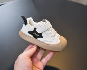Detail view of the durable rubber sole and non-slip anti-kick toe cap on kids sneakers