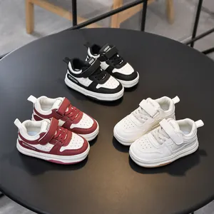 Toddler casual sneakers in black, red, and beige with velcro straps for boys and girls