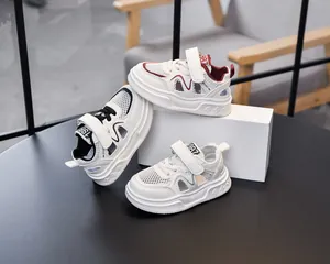 Detail of kids breathable mesh sports sandals with velcro straps and sport texture