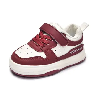 Classic red and beige toddler sports shoes with velcro straps and sportchao logo