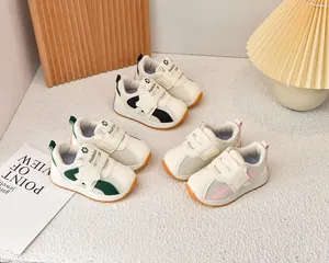 Detailed view of breathable mesh kids sneakers with Velcro straps in three colors