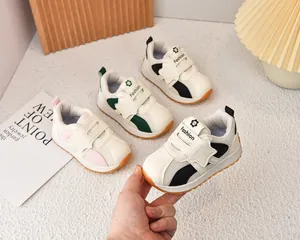 Detail of breathable mesh children's sneakers with non-slip soles and velcro straps