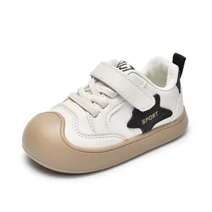 Kids casual sneakers with anti-collision toe cap and star detail in beige and khaki