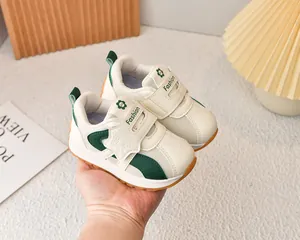 Detail of toddler mesh sneakers with velcro strap and non-slip rubber sole