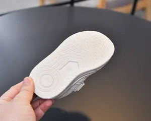 Detail view of toddler sport sandal outsole with star-shaped non-slip patterns