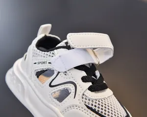 Detail view of children sports sandal featuring breathable mesh and velcro closure