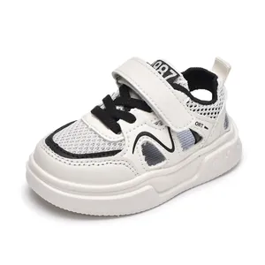 Lightweight black and white kids sports sandals with breathable mesh and rubber soles