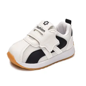 Kids breathable mesh sneakers with star decor and velcro closure in black and white