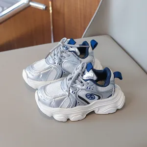 Kids' breathable mesh running shoes in silver and blue with thick anti-slip soles