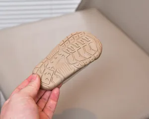 Detail of anti-slip rubber sole for toddler sandals with size 18/130 engraving