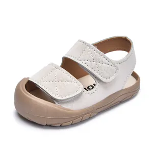 Minimalist beige baby sandals with protective closed-toe and anti-slip rubber sole