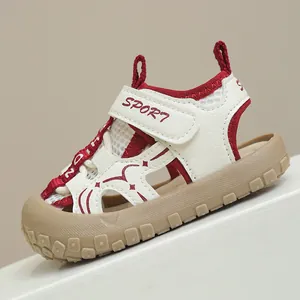 Detail view of children's sports sandals featuring protective toe caps and Velcro closure