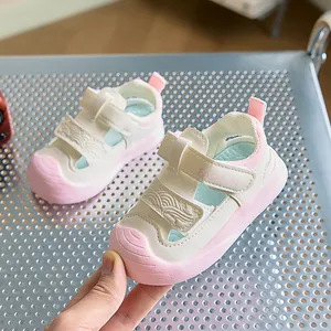 Detail of baby summer sandals with velcro straps and non-slip protective toe design