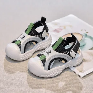 Side view of children's breathable mesh sport sandals with closed-toe safety and velcro strap