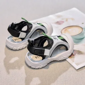 Close-up of kids breathable mesh sports sandals with anti-slip wave texture sole