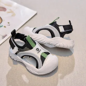 Detail of breathable mesh upper and durable anti-slip rubber sole on kids' sandals