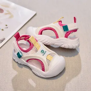 Detail of breathable mesh and anti-collision closed toe on kids sport sandals
