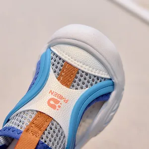 Close-up of breathable mesh upper and durable rubber toe cap on kids sports sandals