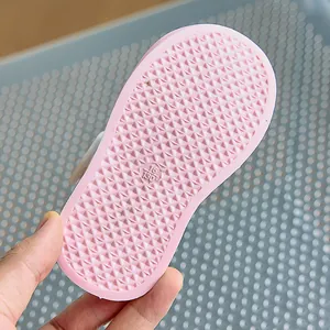 Close-up of pink toddler sandal sole featuring diamond anti-slip patterns and size mark