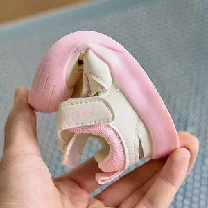 Detail showing the ultra-flexible soft rubber sole of these pink toddler sandals