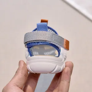 Detail view of children sports sandals featuring mesh upper and adjustable heel strap