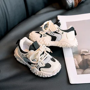 Close-up of lightweight kids mesh sneakers with non-slip thick soles and Velcro design