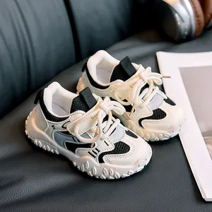 Detailed top view of kids sneakers featuring breathable mesh and thick anti-slip rubber soles