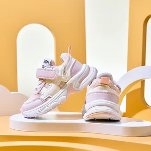 Detailed close-up of pink children's sport shoes featuring breathable mesh and velcro straps