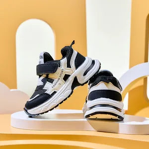 Close-up of breathable mesh fabric and anti-slip thick rubber sole for kids sneakers