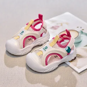 Kids breathable mesh sandals with protective toe cap and anti-slip sole in white and pink