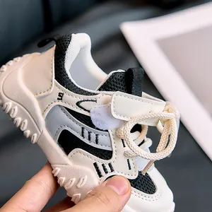 Detailed shot of kids sneakers showing breathable mesh and convenient velcro strap closure
