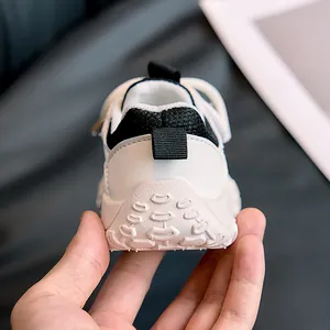 Close-up of anti-slip rubber sole and protective heel on toddler sneakers