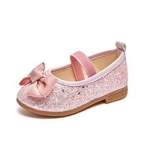 Close-up of pink sequin Mary Jane shoes for girls featuring a grooved rubber anti-slip sole