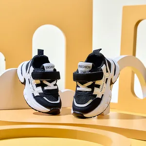 Detail view of breathable mesh sneakers for kids with anti-slip soles and velcro straps