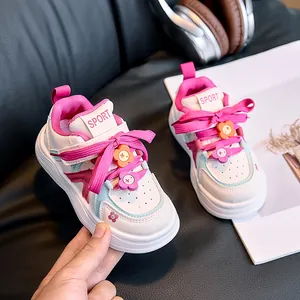 Fashionable kids white sneakers with pastel floral accents and soft non-slip soles