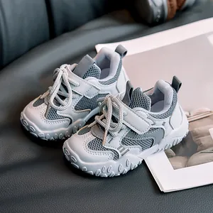Grey-blue kids lightweight sneakers with mesh upper and velcro strap for boys and girls