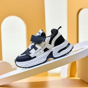 Detail of kids breathable mesh sneaker featuring velcro strap and thick cushioned sole