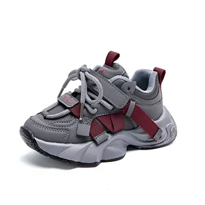 Dark grey kids' chunky sneakers with burgundy accents and anti-slip thick rubber soles